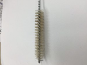 Figure 8. Possible cleaning mechanism to remove chipped filament in print head.